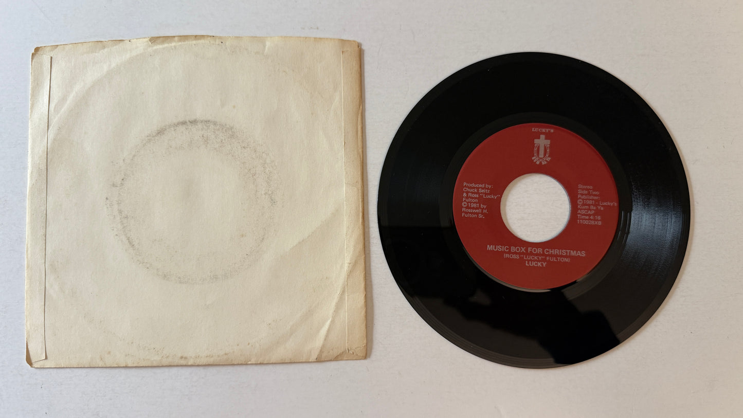 Tracey Lee All I Want For Christmas (Is Love From Mom & Dad) / Music Box For Christmas Used 45 RPM 7" Vinyl VG+\