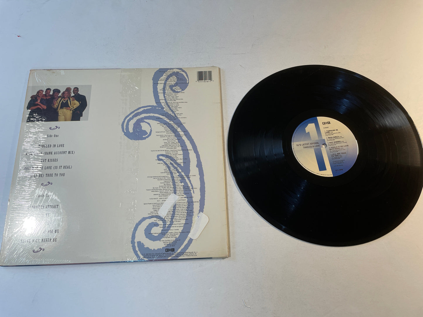 R.J.'s Latest Arrival Tangled In Love Used Vinyl LP VG+\VG+ Black