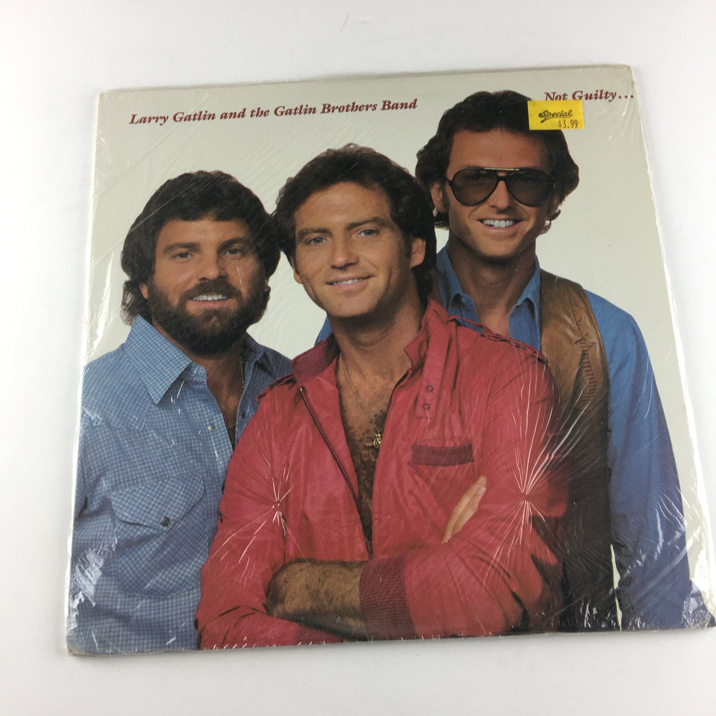 Larry Gatlin & The Gatlin Brothers Not Guilty Used Vinyl LP M\VG+